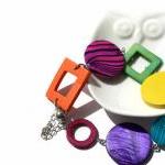 Chunky bracelet in rainbow colors, orange, hot pink, green, purple, yellow and blue.
