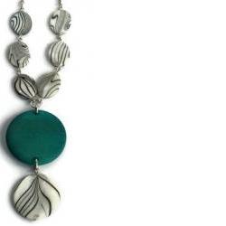 Chunky necklace in turquoise blue, black and white lake shells and wood beads. Pendant necklace. Wood necklace.