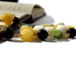 Beaded gemstone necklace made of jade and howlite in white, apple green, sunny yellow and black. Spring fashion. Ready to ship.