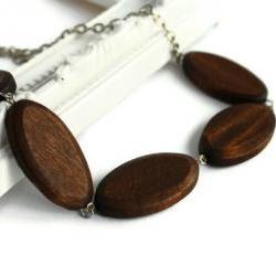 Brown chunky bead necklace. Oval wood beads.